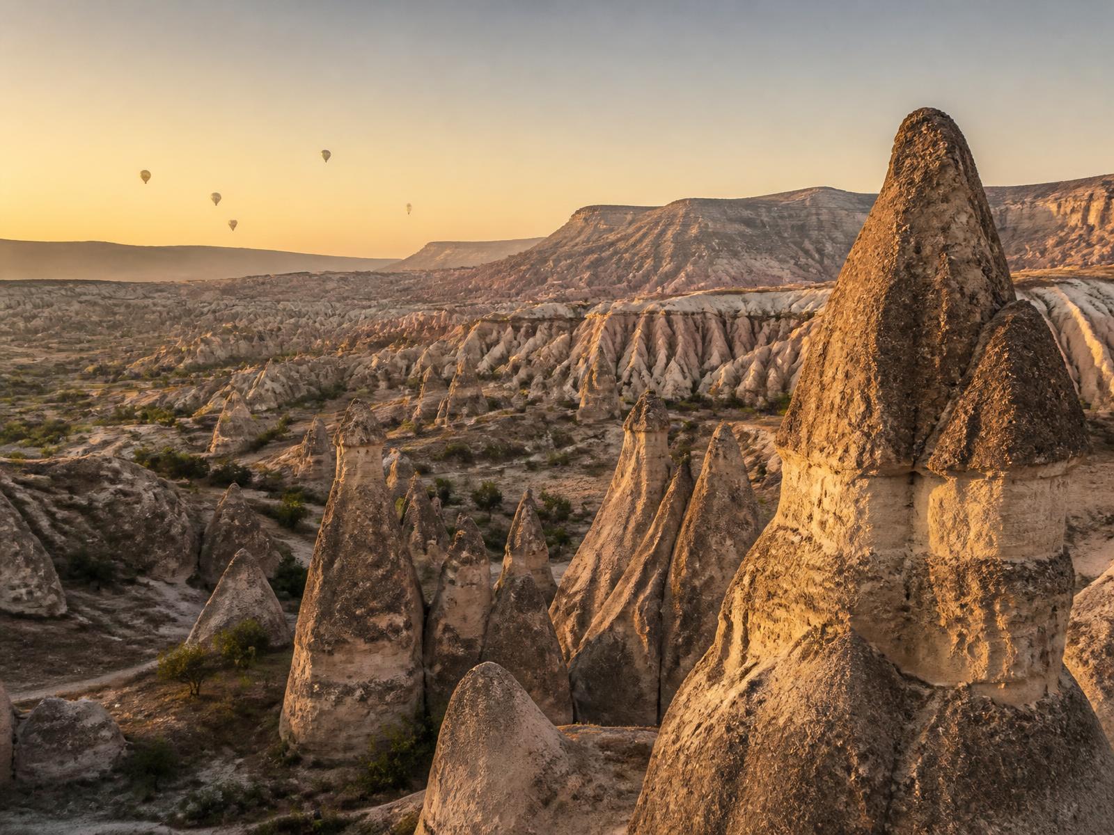 Cappadocian valleys and rock formations at first light
